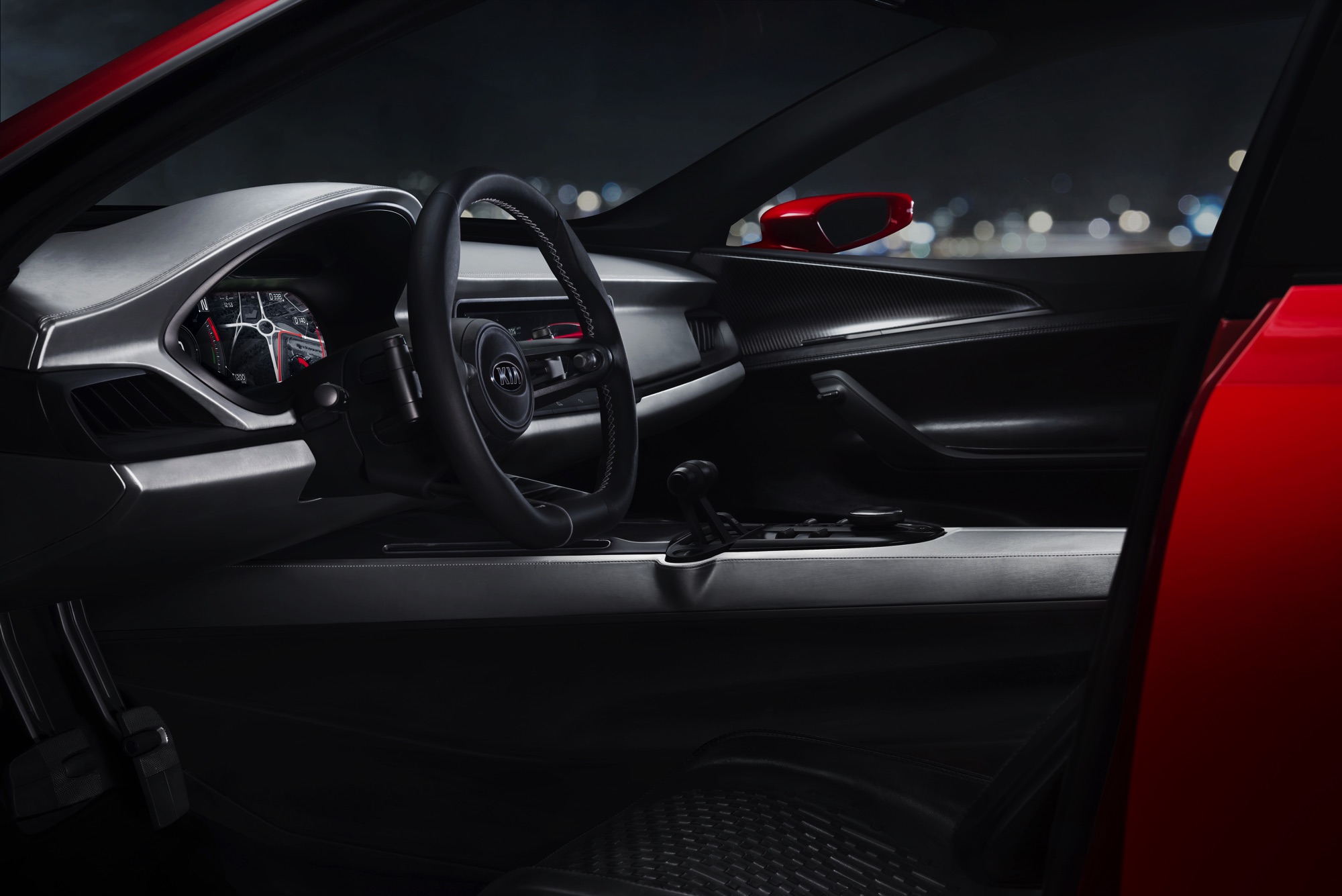 Grote wielen, uitgeklopte wielkasten, knalrood en met flinke uitlaten. We hebben het hier over Kias nieuwste conceptcar, de Sportspace, binnenkort te zien in Genve.