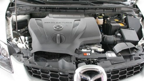 Misschien is de Mazda CX-7 wel de eerste auto die zijn aanduiding Sports Utility Vehicle echt eer aandoet. Want als je hem zo ziet staan lijkt het net of er een sportauto is gekruist met een terreinwa