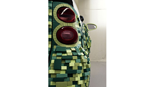 Nou bijna dan. Een smart is normaliter opgebouwd uit een veilige tridion kooi en bedekt met kunststof panelen in diverse kleuren. Smart reed echter langs bij Cartondruck, een producent van verpakkings