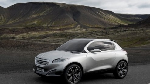 Dit is m dan, de Peugeot HR1. Een spectaculair studiemodel met twee tot vier zitplaatsen dat volgens zijn makers op een bijzondere manier een stadsauto, SUV, en coup in zich verenigt. De aandrijving