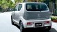 De achterkant van de Japanse Suzuki Alto. Andere kleur achterklep!