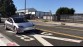 Tesla Model 3 rijdend in beeld
