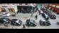 Colonne Toyota iQ door de Amsterdamse binnenstad