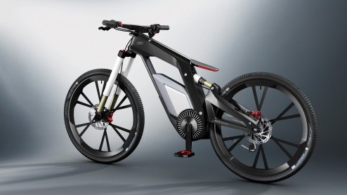 Het Duitse merk met de vier ringen gooit het even over een hele andere boeg: vier wielen en een motorblok worden ingewisseld voor twee wielen en trappers. Oke, en een elektromotor. De E-Bike is gebore