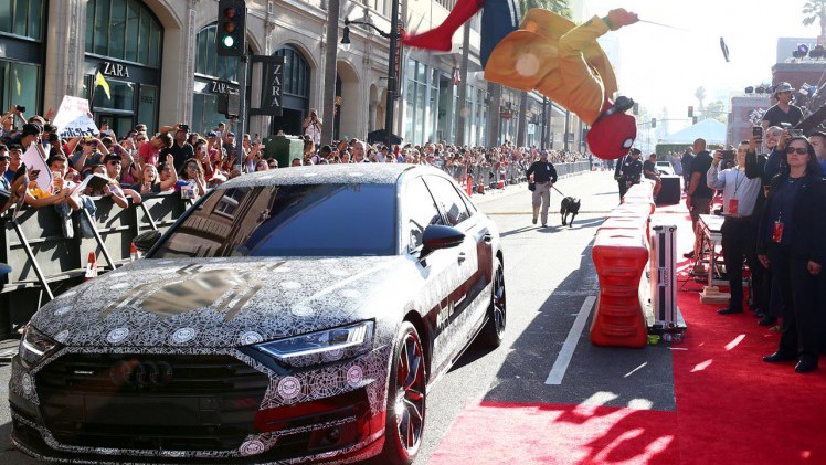 Audi heeft een gecoufleerde nieuwe A8 laten zien tijdens de Hollywood-premire van de film Spiderman.