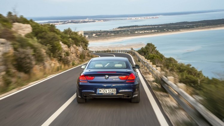 Klanten van de BMW 6 Serie hadden twee eisen: hij moest meer geluid gaan maken ?n wat sportiever rijden. Wij mochten op de wegen rond Lissabon uitzoeken of BMW geluisterd heeft. Een eerste indruk.