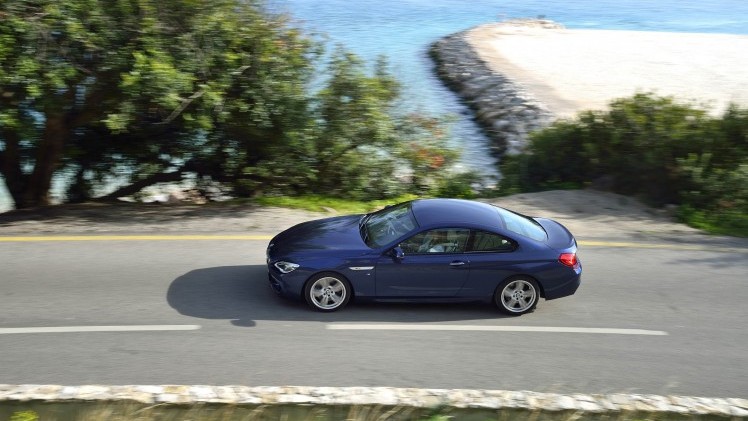 Klanten van de BMW 6 Serie hadden twee eisen: hij moest meer geluid gaan maken ?n wat sportiever rijden. Wij mochten op de wegen rond Lissabon uitzoeken of BMW geluisterd heeft. Een eerste indruk.