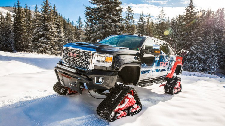 Met vier rupsen is de GMC Sierra oppermachtig in de sneeuw.