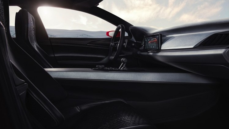 Grote wielen, uitgeklopte wielkasten, knalrood en met flinke uitlaten. We hebben het hier over Kias nieuwste conceptcar, de Sportspace, binnenkort te zien in Genve.