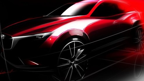 Mazda heeft een eerste foto vrijgegeven van de CX-3. De kleine broer van de CX-5 is een compacte crossover in de klasse van de Renault Captur en Peugeot 2008. De CX-3 debuteert op de LA Auto Show