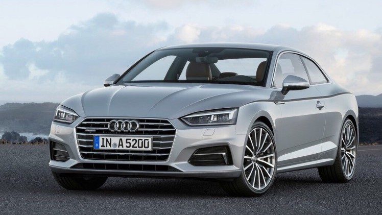 Onthulling Audi A5 Coup? bij de perspresentatie in Ingolstadt. De nieuwe Audi A5 is iets groter, ruimer, zuiniger en nog sportiever dan zijn voorganger en komt in de herfst 2016 naar Nederland.