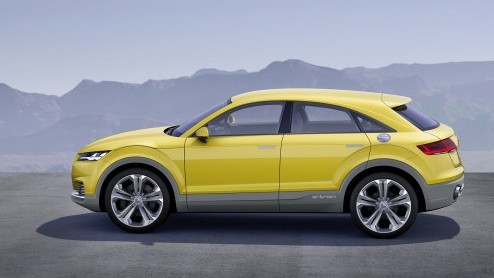 Audi TT offroad concept is een vierdeurs TT met SUV-trekjes en een plug-in hybride aandrijflijn. Bijzonder is dat de accu's inductief kunnen worden geladen. Presentatie in Peking.