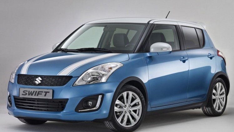 Suzuki Swift Beat actiemodel met Pioneer audio en subwoofer.