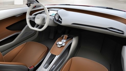 Audi presenteert op de IAA in Frankfurt de e-tron, een compacte volledig elektrisch aangedreven supersportwagen. Elk wiel wordt aangedreven door een eigen elektromotor, wat de e-tron tot een onvervals