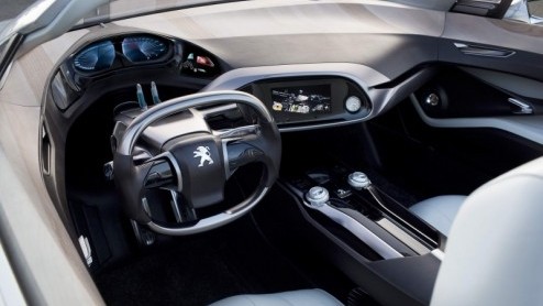 De Peugeot SR1, onthoud m goed. Deze bijzonder sportieve conceptauto steelt niet alleen de show met krachtige hybrideaandrijving, maar is ook een voorbode van de nieuwe designtaal voor nieuwe modelle