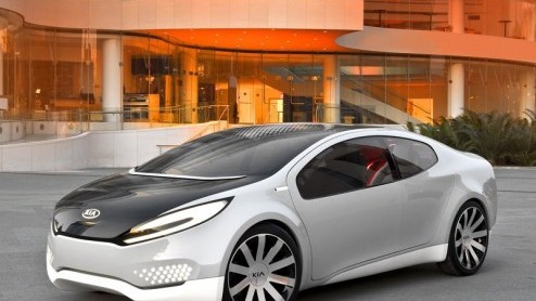 Na twee puzzelstukjes is het mysterie vanaf nu opgelost. Dit is de Kia Ray concept; een vierdeurs middenklasser met coupe-trekjes en een hybride aandrijflijn onder de kap.