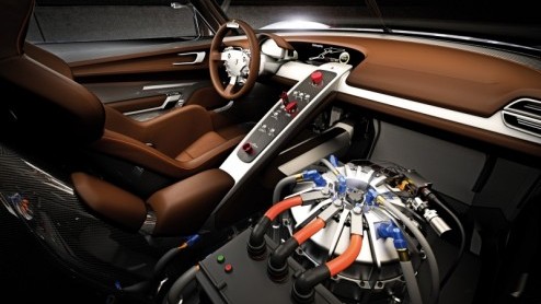 Dit is de coup met middenmotor waar Porsche het al een tijdje over heeft; de Porsche 918 RSR. Een spectaculaire samensmelting van de 911 GT3 R Hybrid met het design van de 918 Spyder die eerder dit j