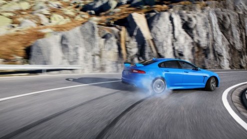 Vandaag gaat de Jaguar XFR-S eindelijk in vol ornaat uit de doeken. De eerste beelden zijn inmiddels al beschikbaar en inderdaad; onder de motorkap liggen 550 paarden op de loer.
